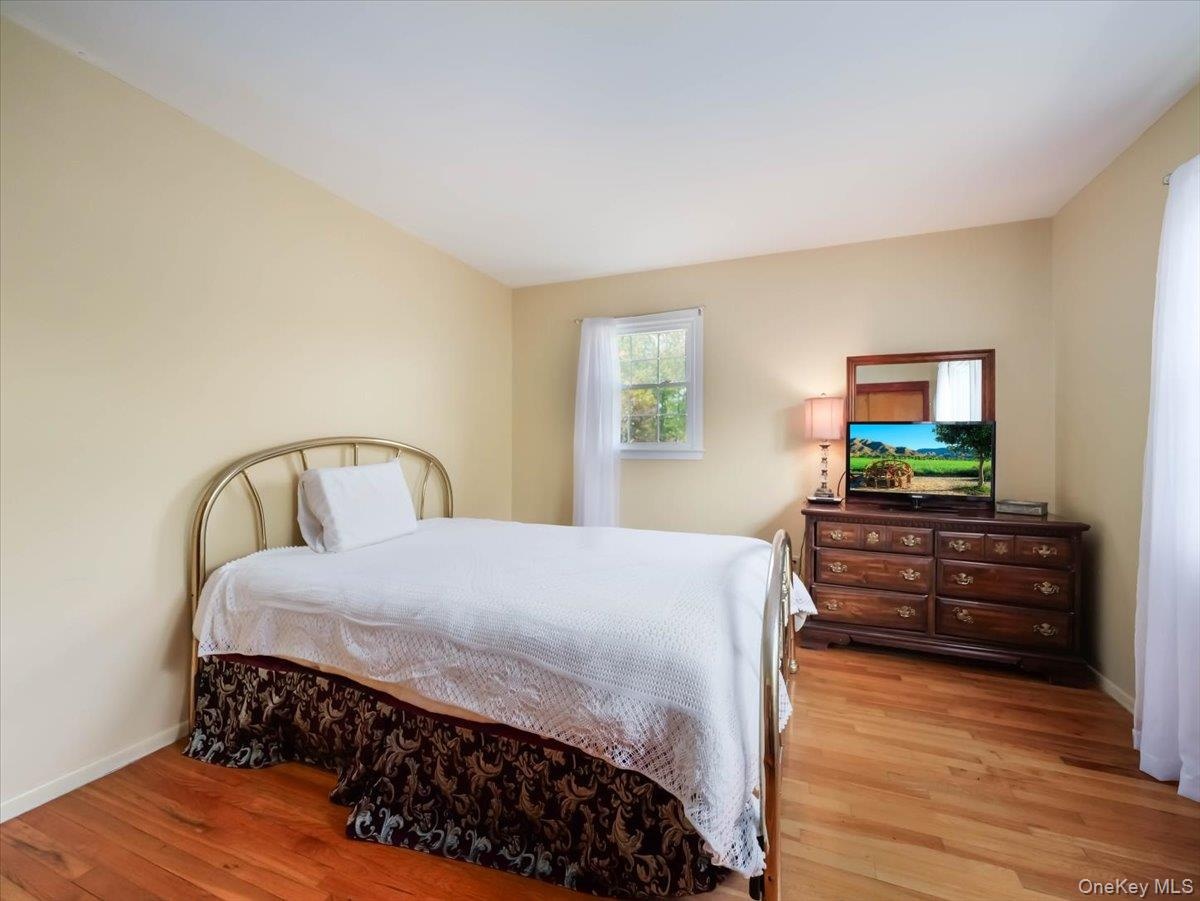 Wood-finish flooring and a single-pane window