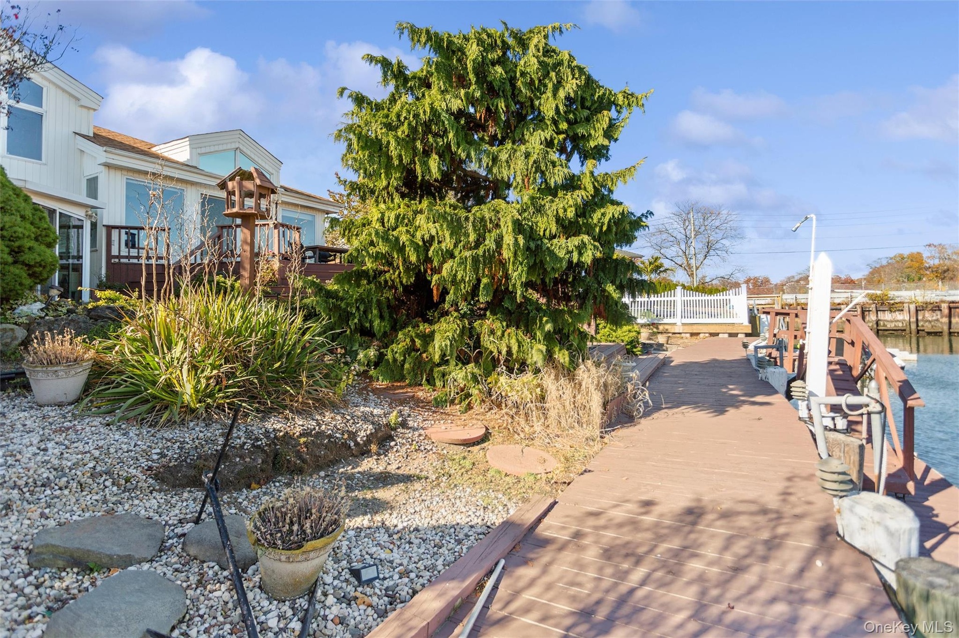 View of community with a boat dock