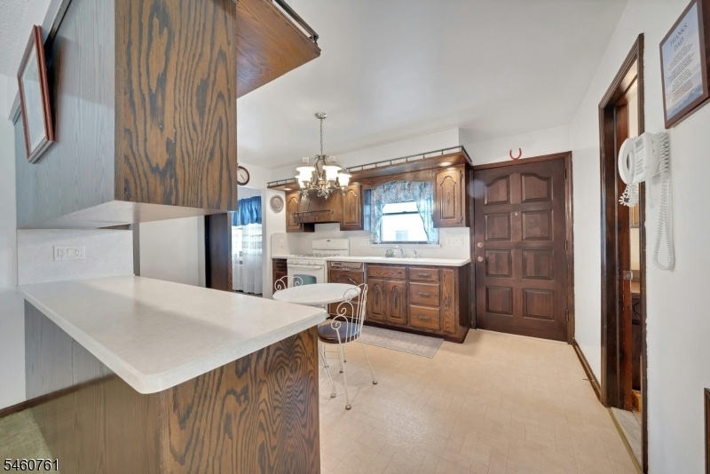 Kitchen, Bath + Front Entrance
