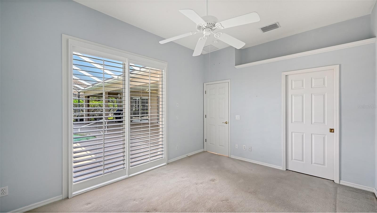 Guest Bedroom and pool door