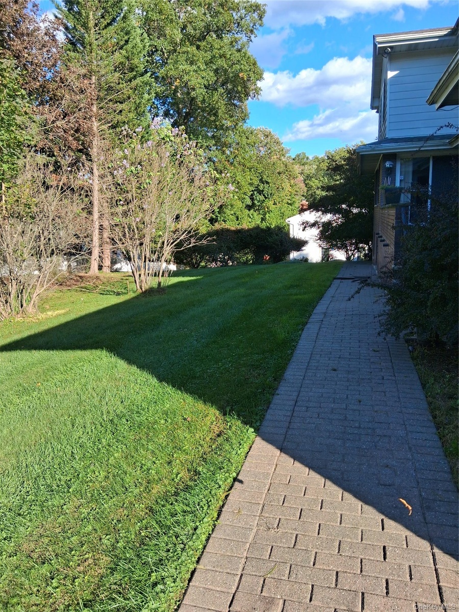 SIDE/BACK ENTRY.BRICKWALKWAY