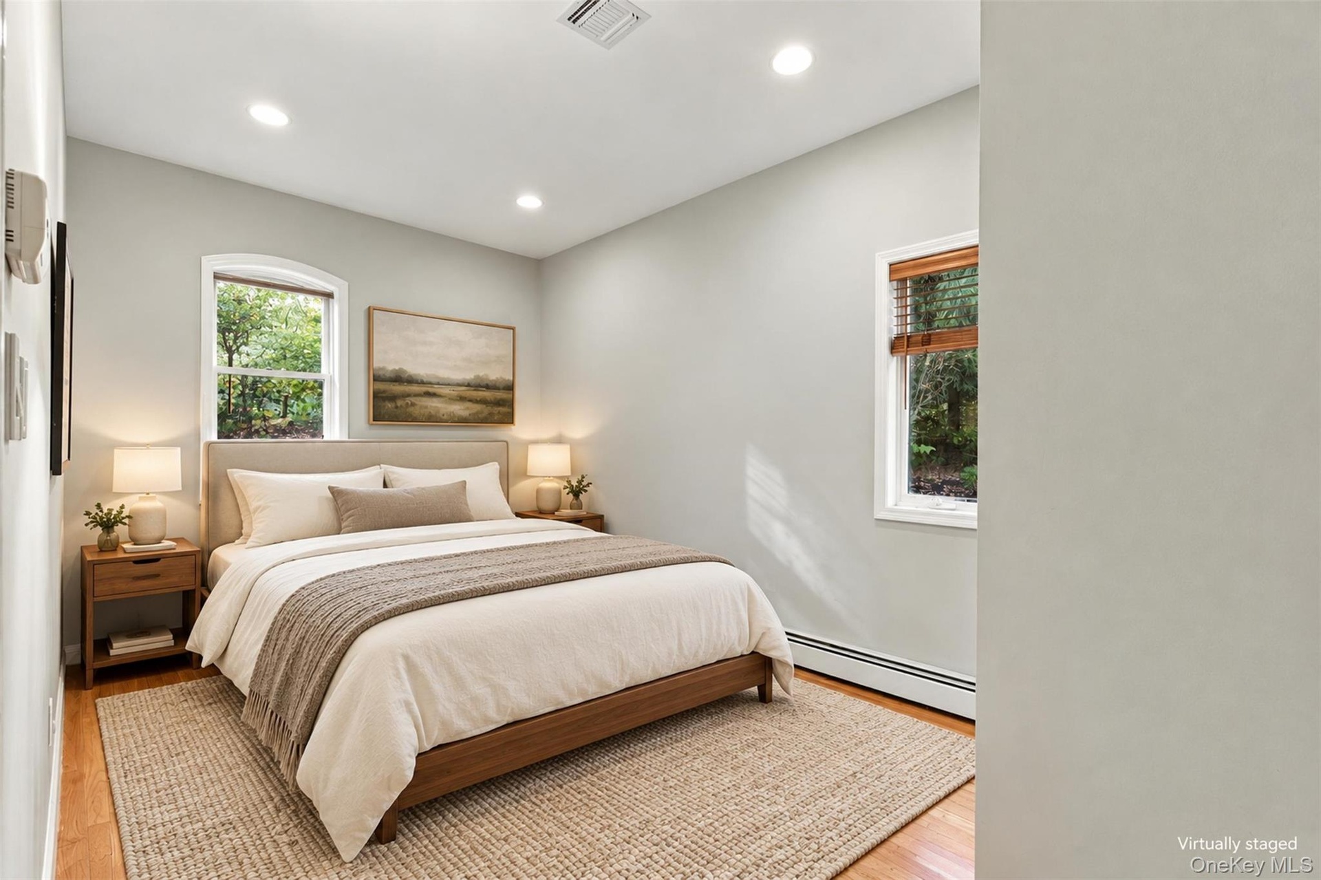 First floor bedroom virtually staged, currently set-up as an office