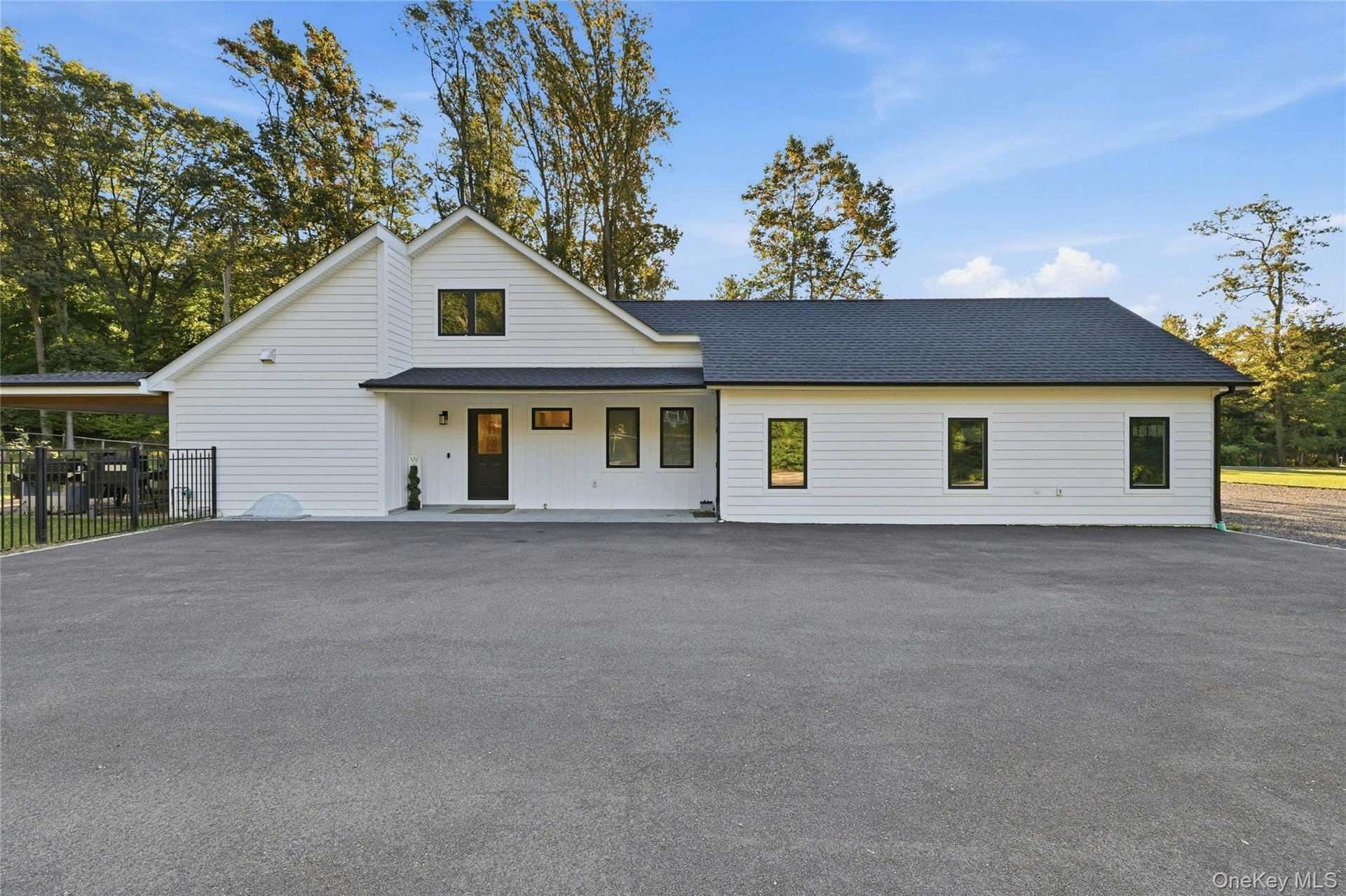Hardie Board Siding, New Roof and Windows.   Side Entry and Two Car Garage