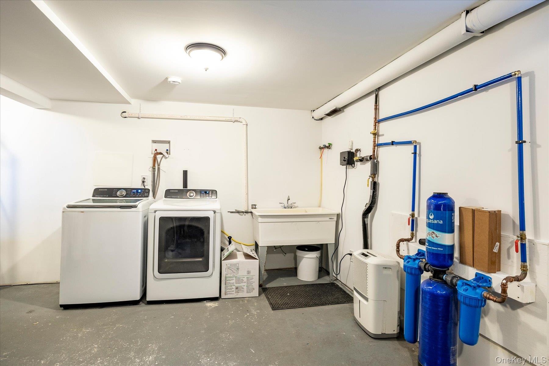 Lower level laundry area.