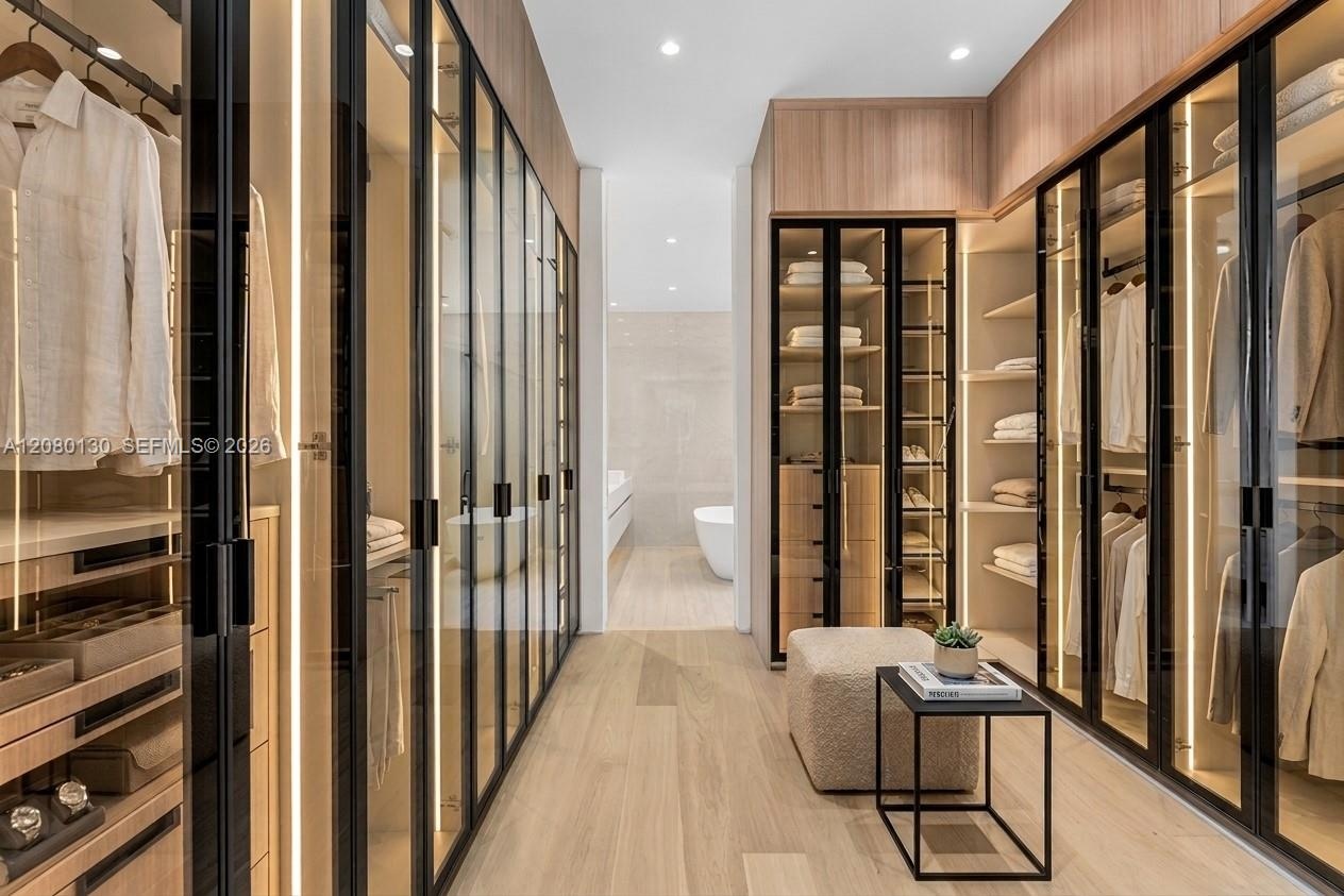 Primary Dressing Room. Disclaimer: Several photographs presented in this listing contain digitally added furniture, artwork, and decor. These virtuall