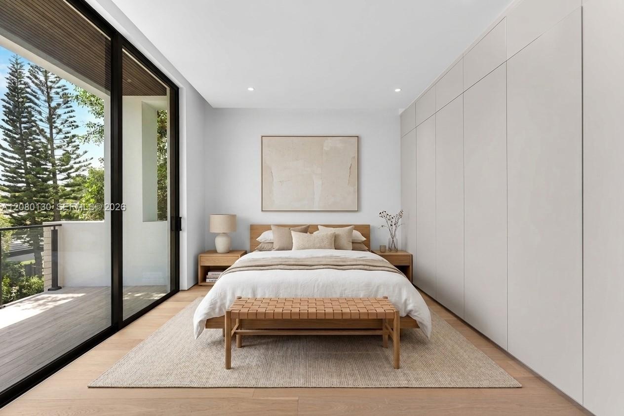 Guest Bedroom. Disclaimer: Several photographs presented in this listing contain digitally added furniture, artwork, and decor. These virtually staged