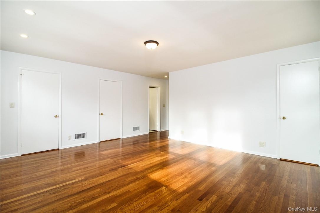 Additional view of large principal suite facing closets and door to ensuite bath.Photos taken when house was empty prior to occupancy.