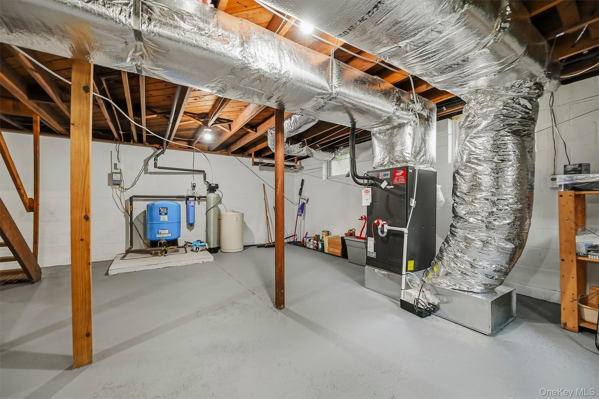 Unfinished basement/Laundry/Utilities