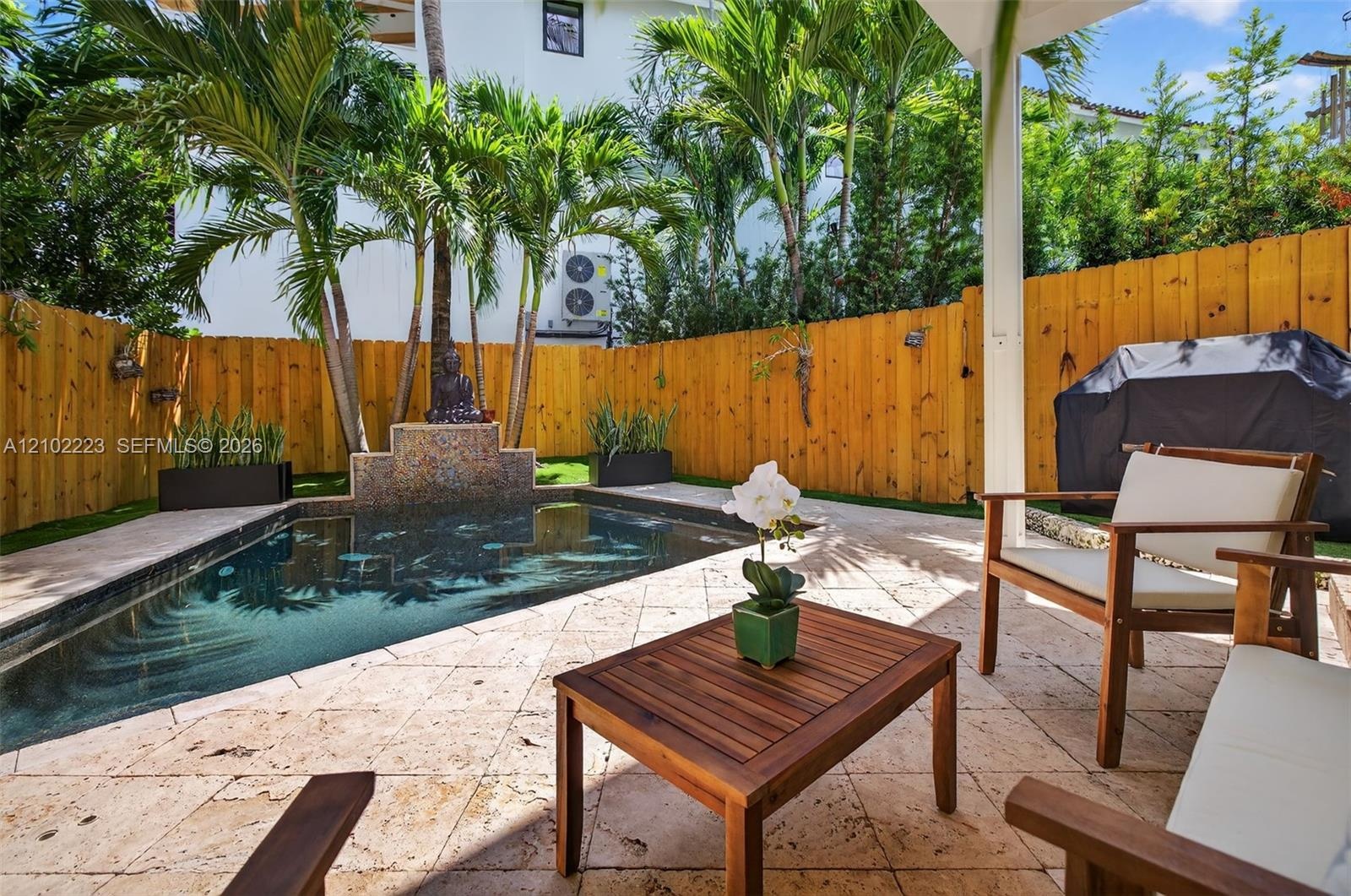 A charming boutique style tropical oasis, where swaying palms cascading waterfall in a sparkling saltwater pool create an inviting setting for relaxat