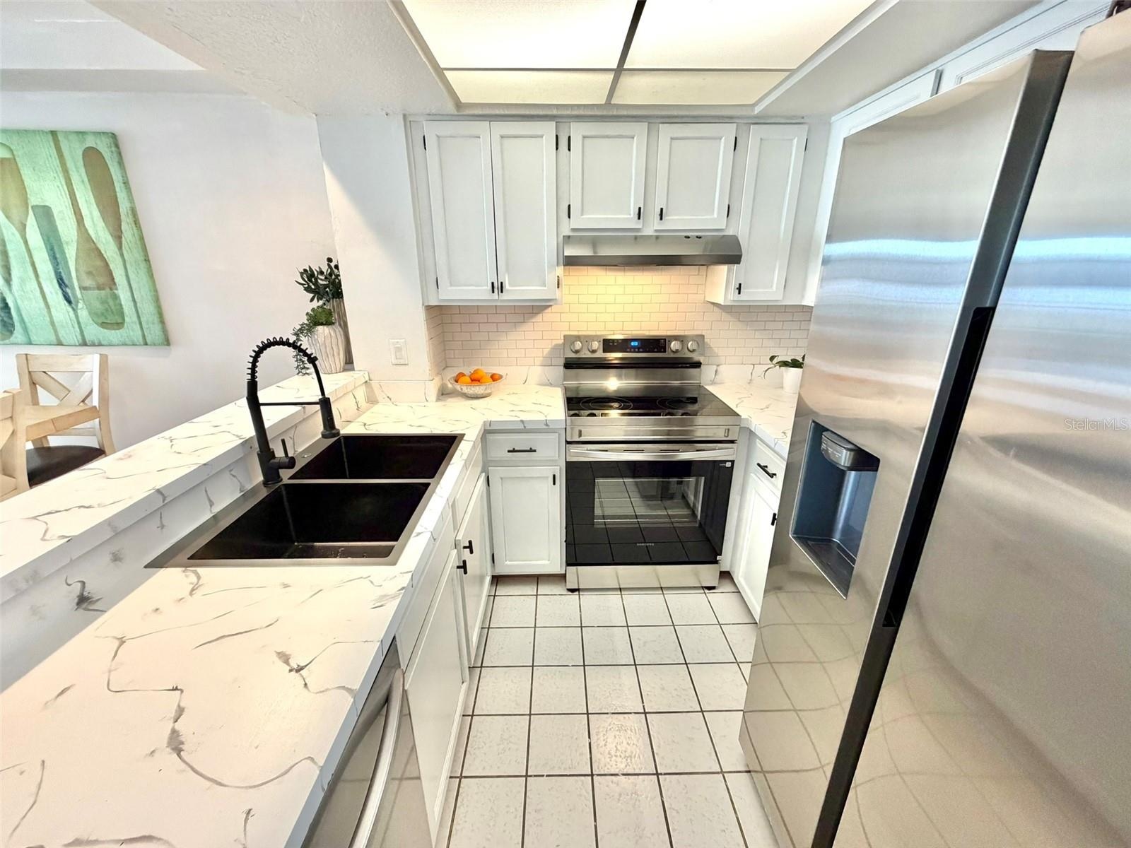 Open kitchen with Breakfast Bar.