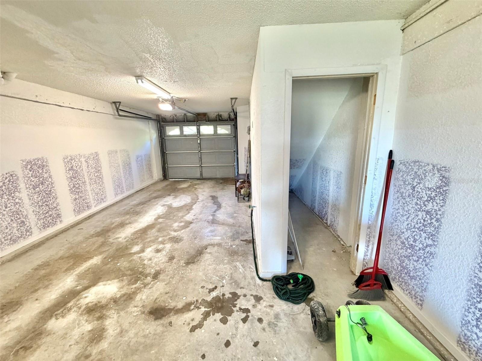 Tandem Three Car Garage with Storage Space
