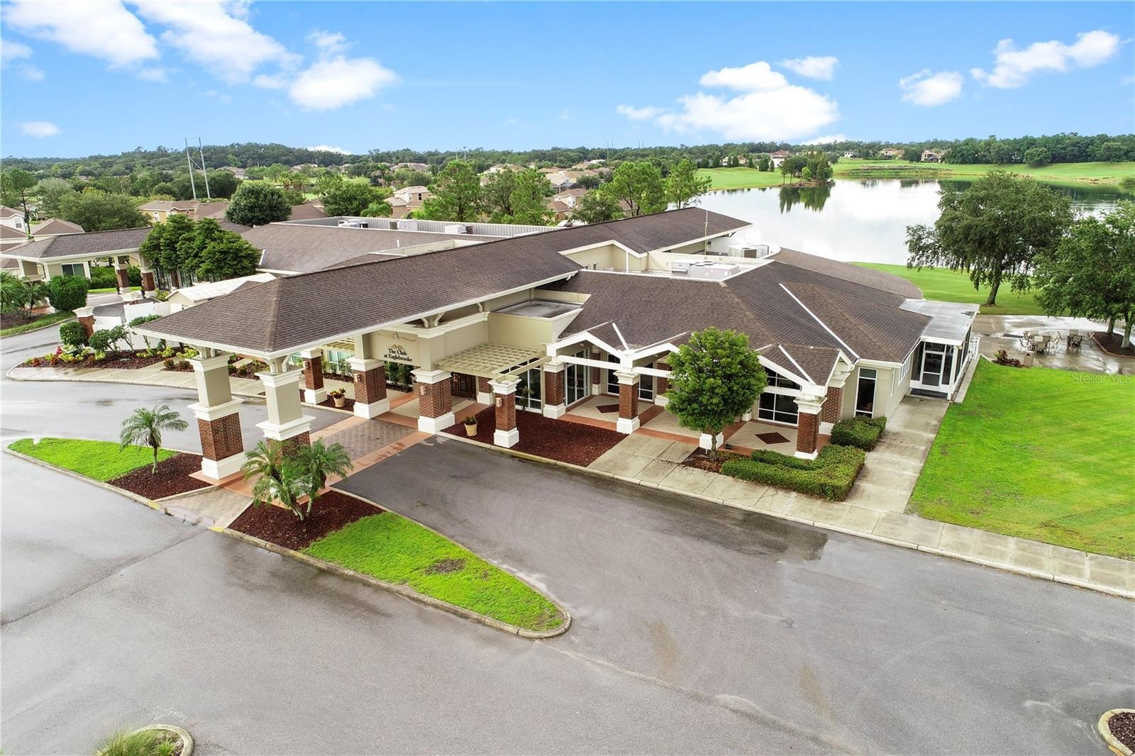 Central to the community is the main clubhouse with dining/bar areas, golf pro-shop, locker rooms and . . .
