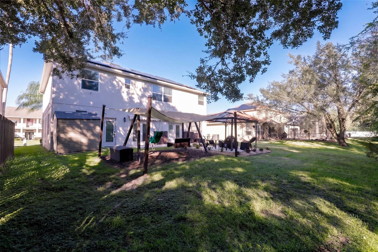 Back yard with swing set