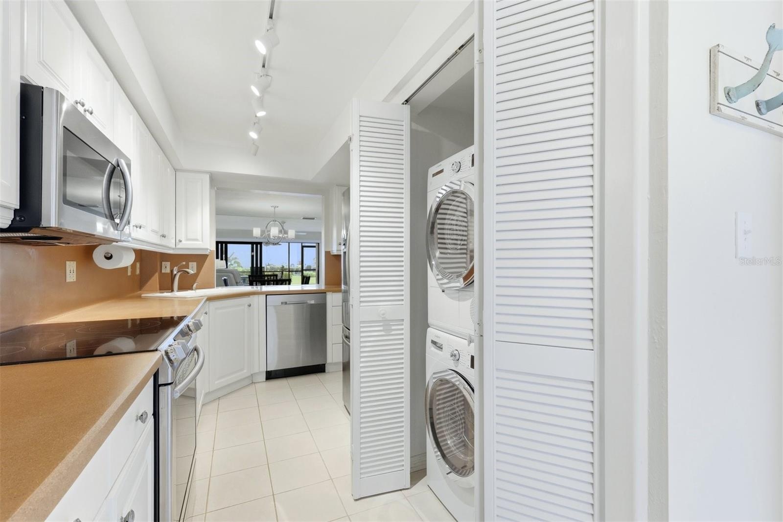 Kitchen with washer/dryer