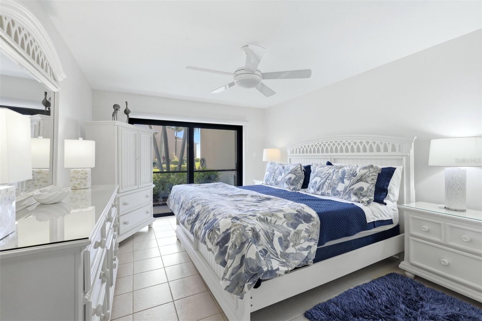 Primary bedroom with impact rated slider to lanai