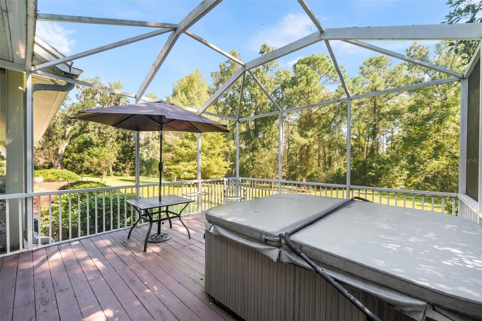 Screened porch with hot tub off of master bathroom