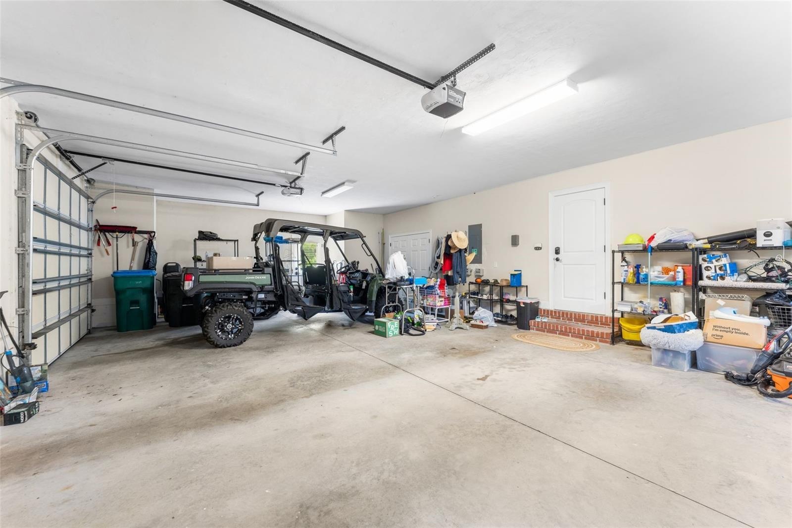3 car oversized garage with storage closet