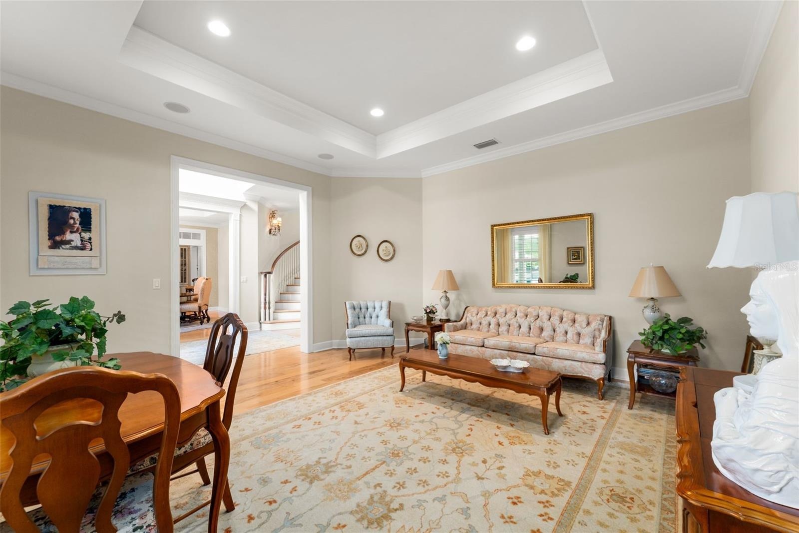 formal living room/den off of foyer