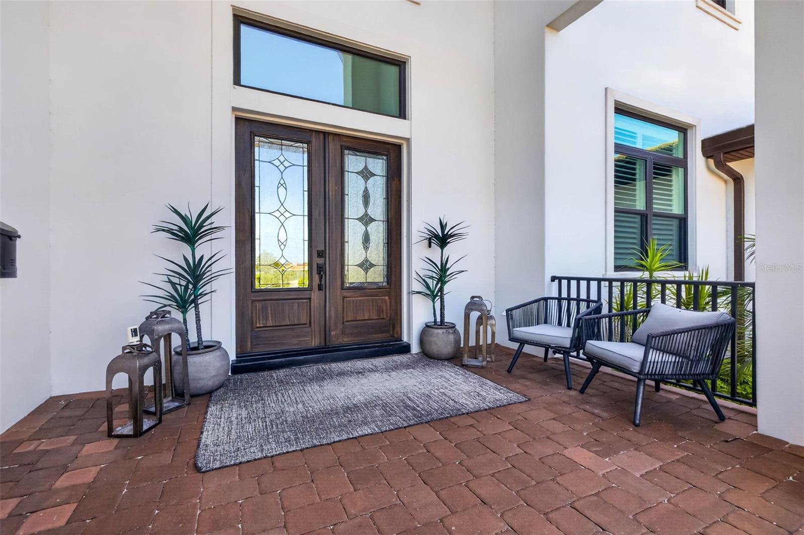 Refined Covered Entry Offering a Warm Welcome