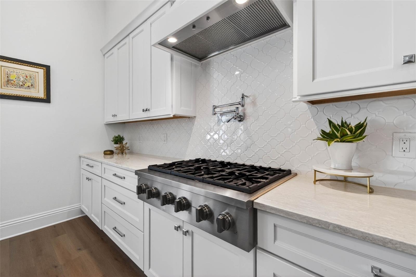 Culinary Excellence with a Six-Burner Gas Cooktop & Pot Filer