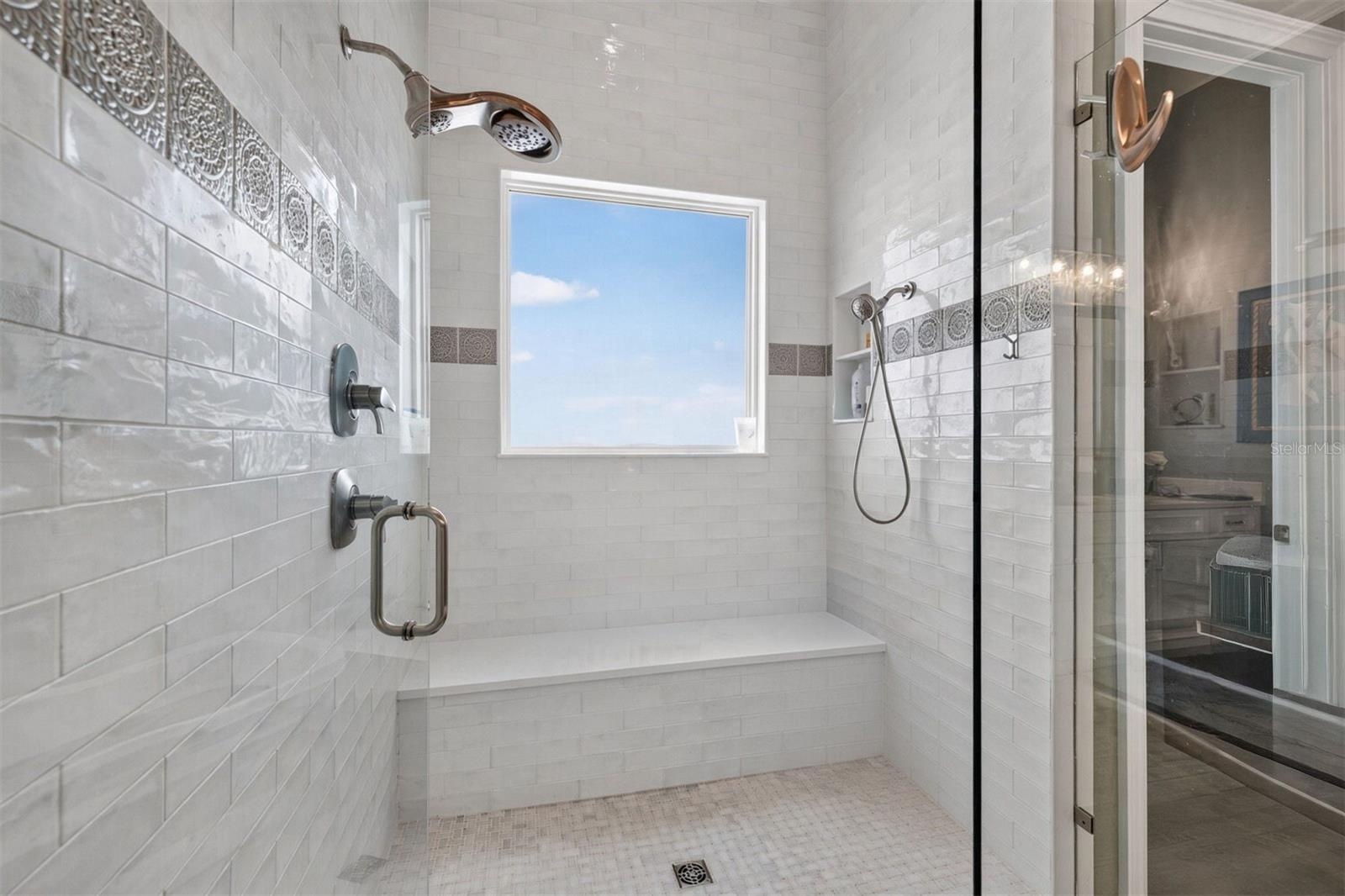 Primary Shower with Bench Seat and Multiple Shower Heads