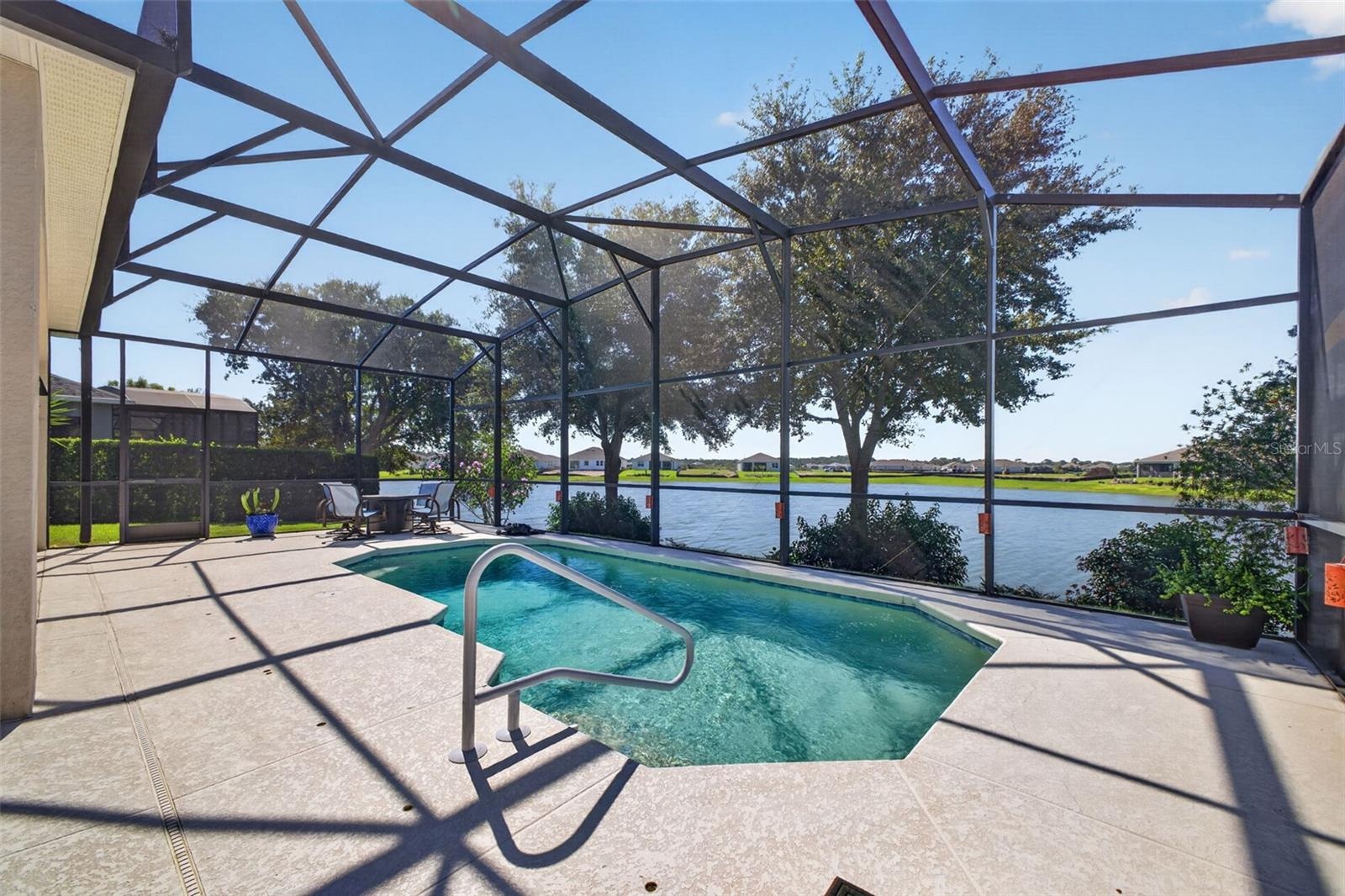 Expanded for maximum outdoor enjoyment, the generous lanai and patio create a seamless backyard oasis built for effortless relaxation and entertaining