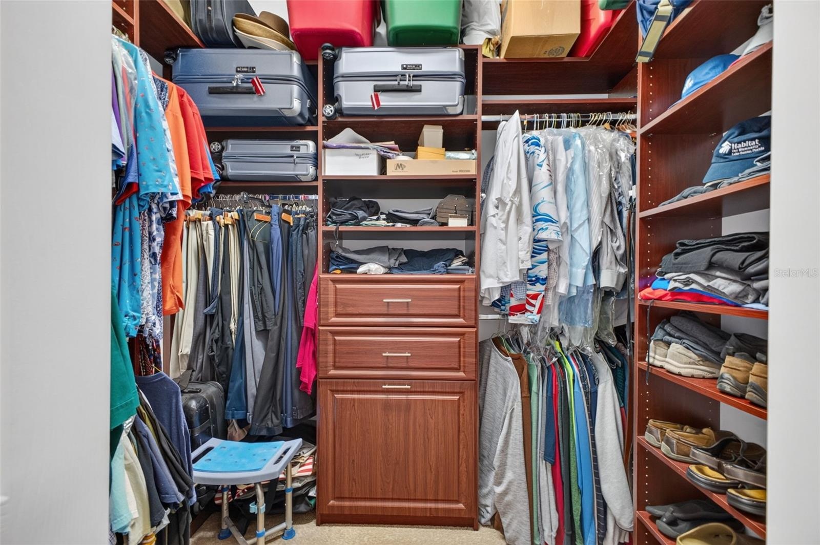 The primary suite features generous dual walk-in closets, providing ample room for extensive wardrobes and personal storage.