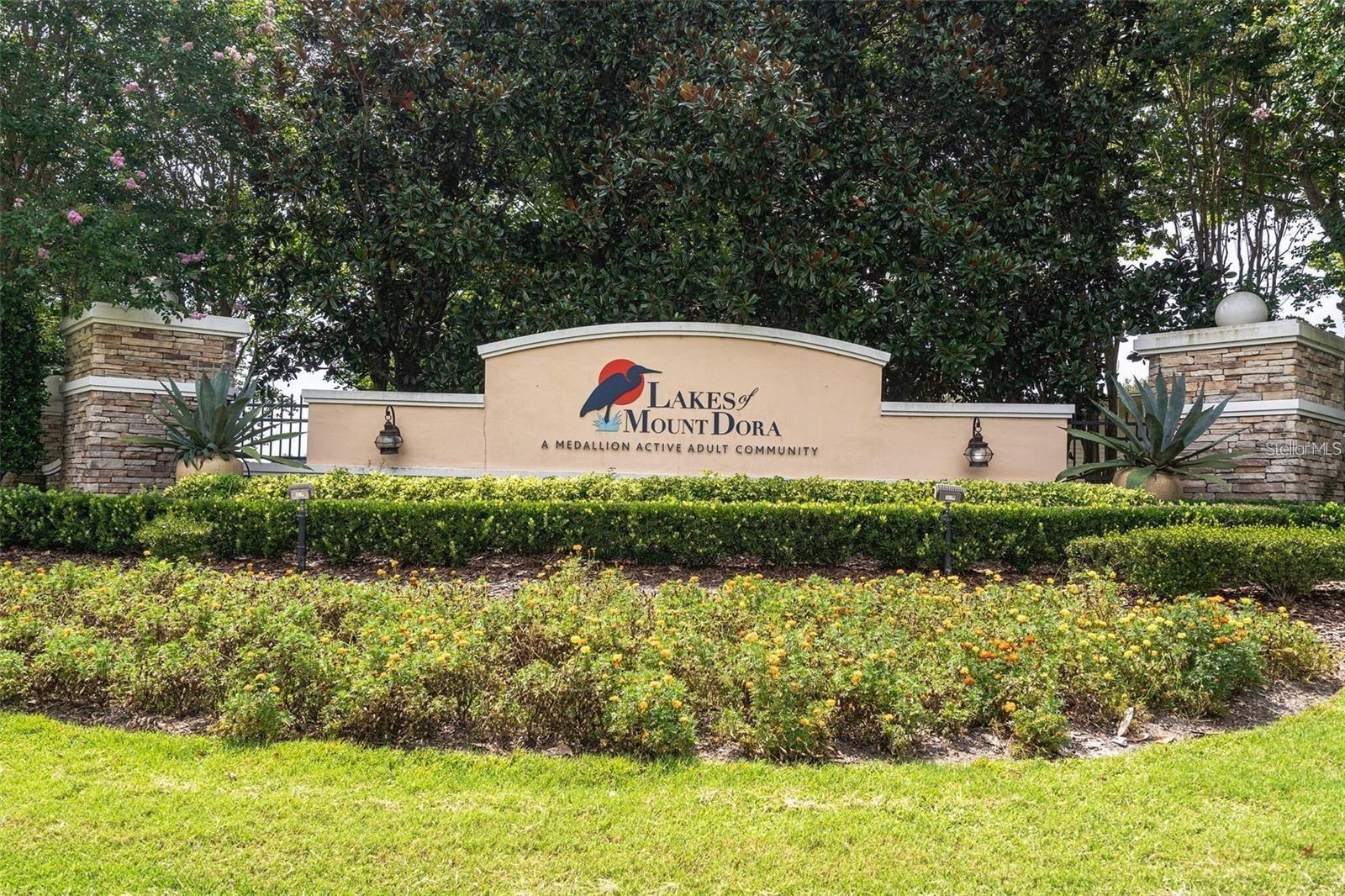 The elegant entrance sign marks the gateway to the highly sought-after Lakes of Mount Dora lifestyle.