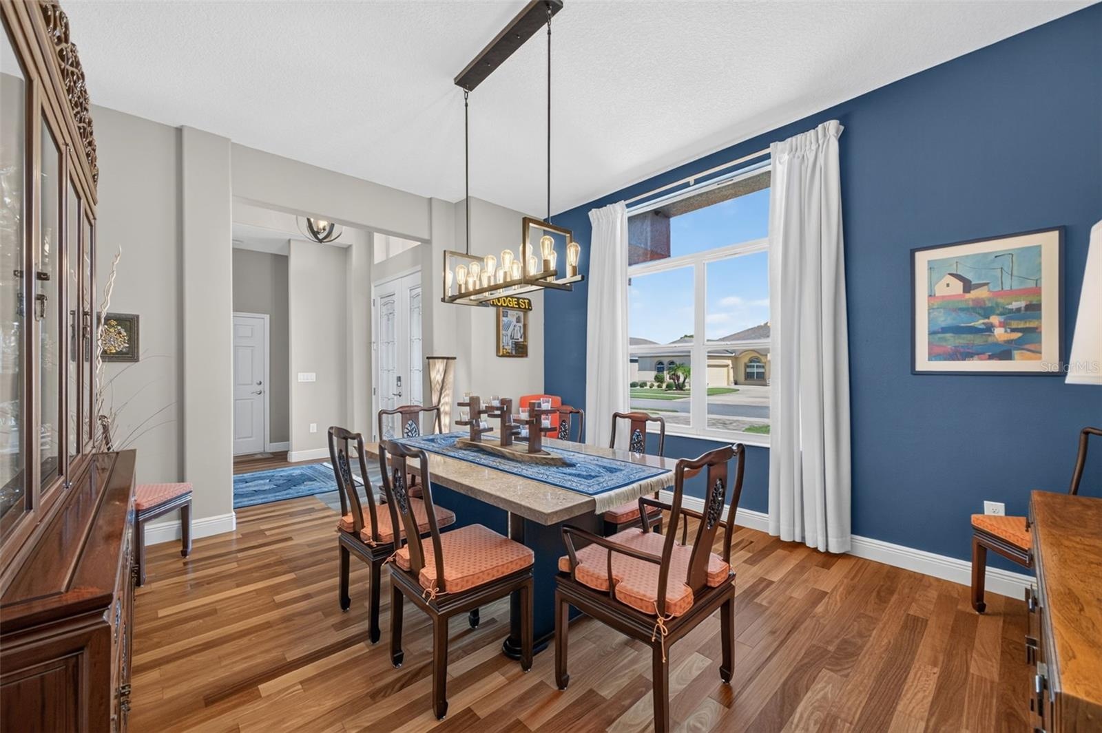 The spacious dining room offers plenty of room to expand your table, making it easy to host family dinners, holiday celebrations, and neighborhood get