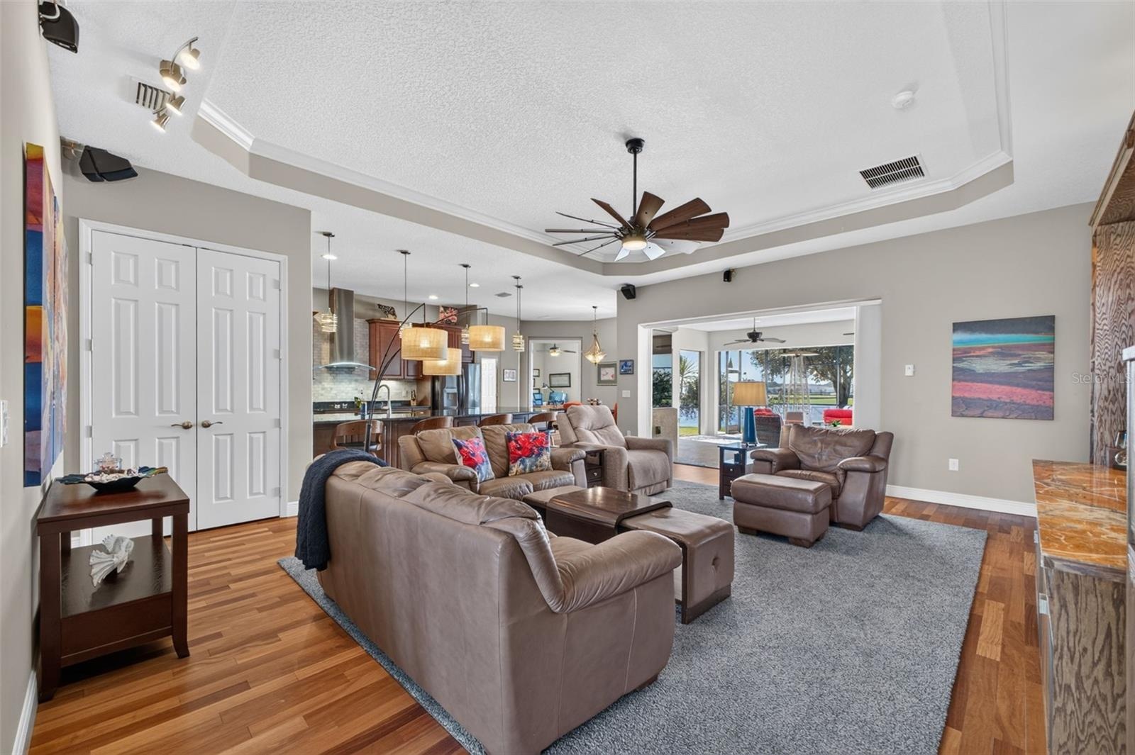 An expansive great room flows effortlessly into the casual dining area and kitchen, creating the ultimate hub for daily living and entertaining.