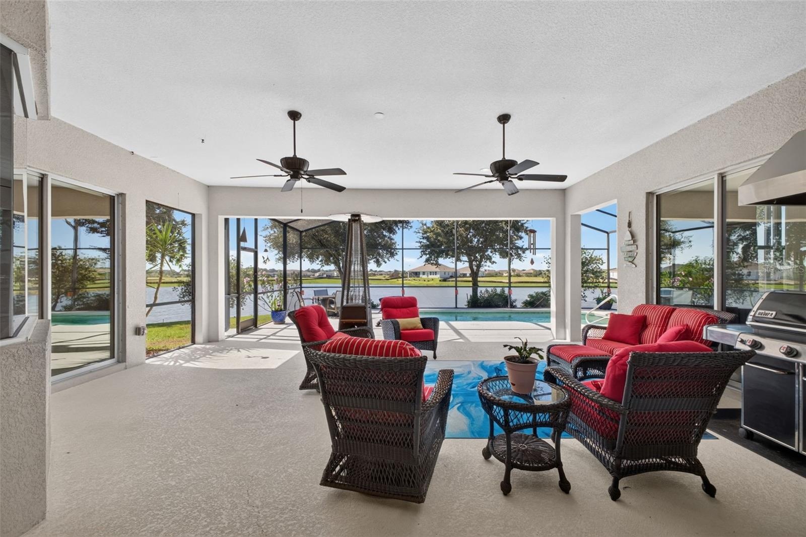 The lanai is spacious and has plenty of space in the shade, with easy access to the pool and sunshine.