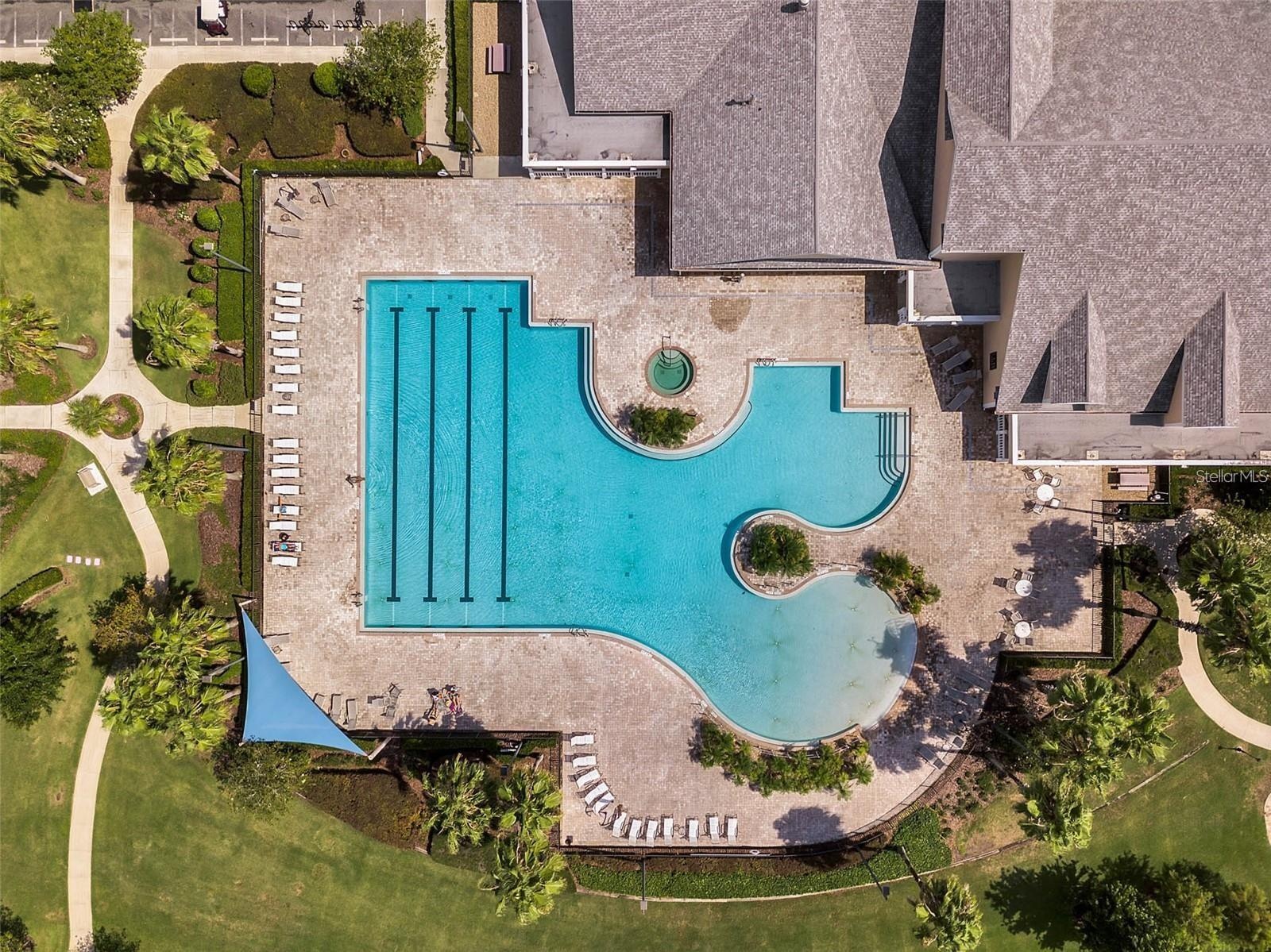 Unwind at the community's heated, resort-style pool—a serene oasis designed for relaxation, swimming laps, or lounging under the sun.