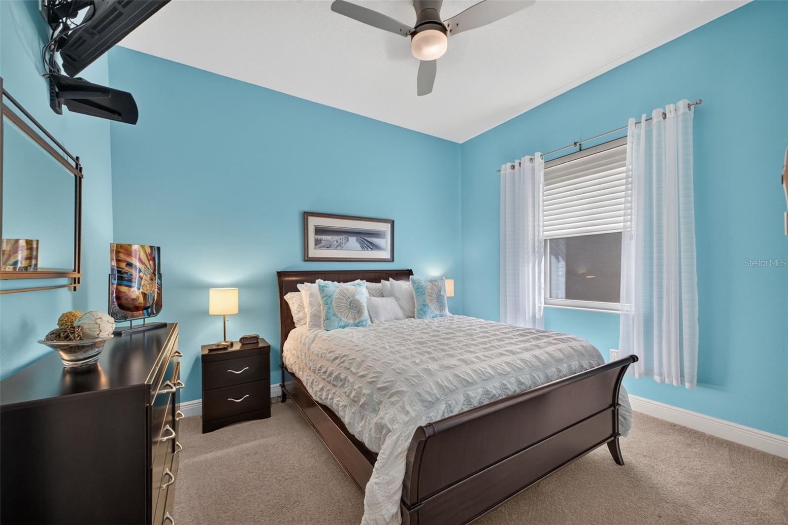 A bright and welcoming retreat, this third bedroom offers generous proportions to comfortably accommodate overnight guests in style.