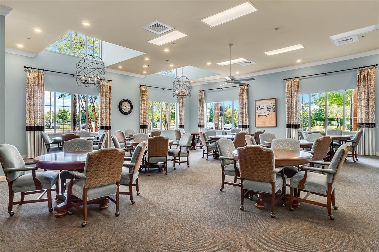 Enjoy friendly competition and social clubs in the climate-controlled card room, complete with dedicated game tables and seating.