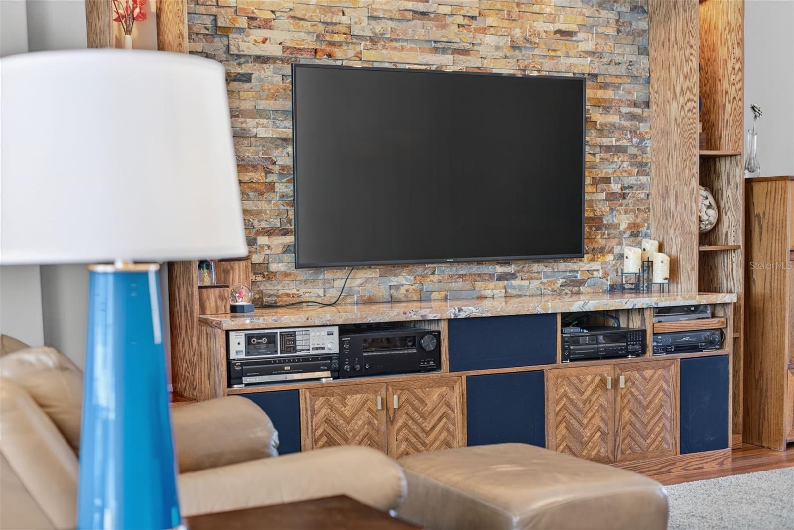 Custom made media wall with storage for all your entertainment equipment.