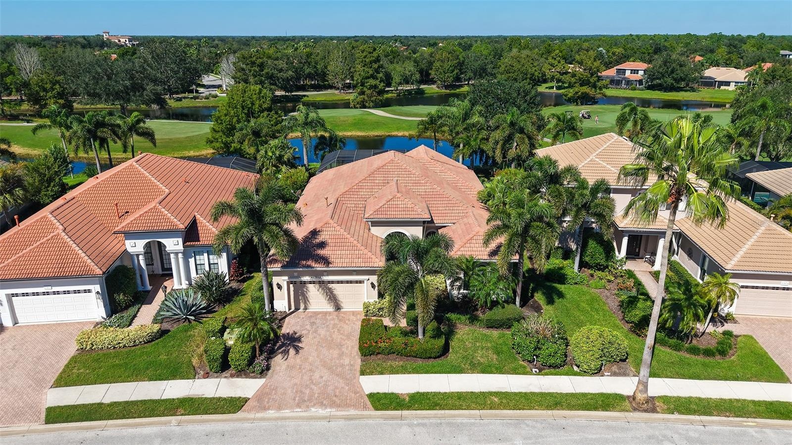 Set on a gorgeous lake and golf course view lot.