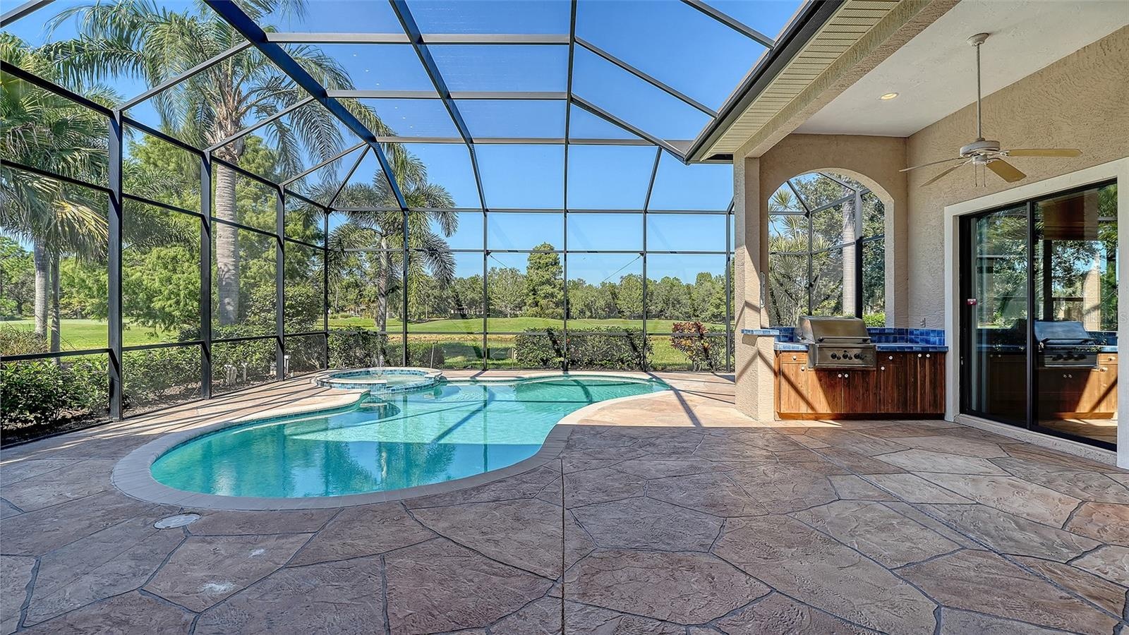 Resort style pool with self cleaners and pebbletec