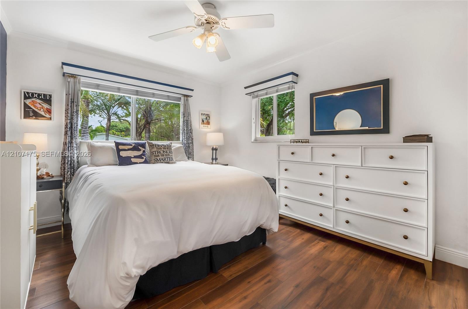 2nd Bedroom has beautiful blinds and impact sliding windows with valances