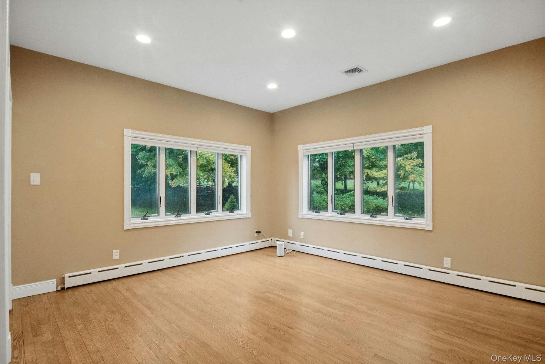Bedroom #3 with natural light and 2 closets.
