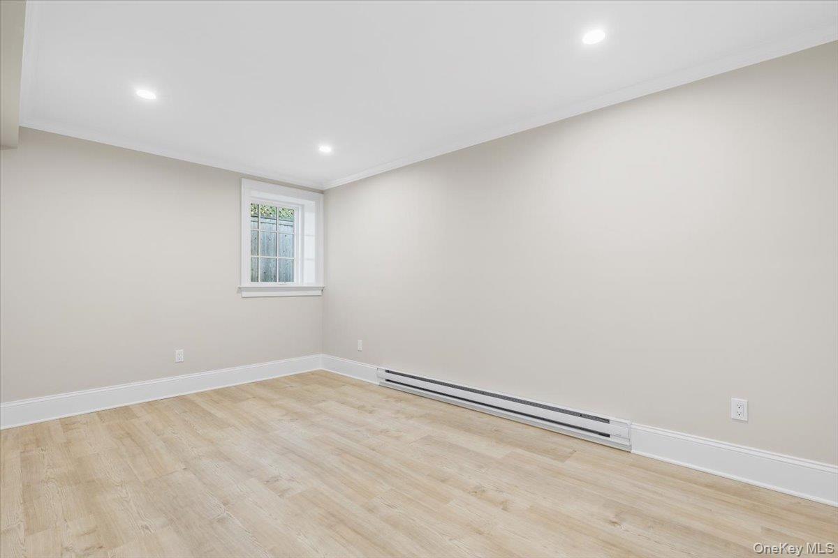 Lower level bedroom w/ large closet.