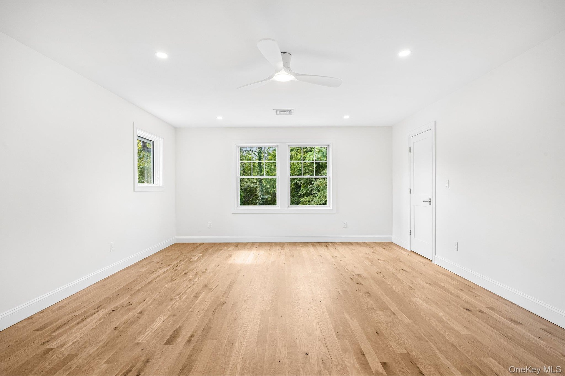 A bright bedroom for guests, a studio or a reading room. The library's Knit Night and Book Club meet about 700 feet away, with a CoHo latte to carry h