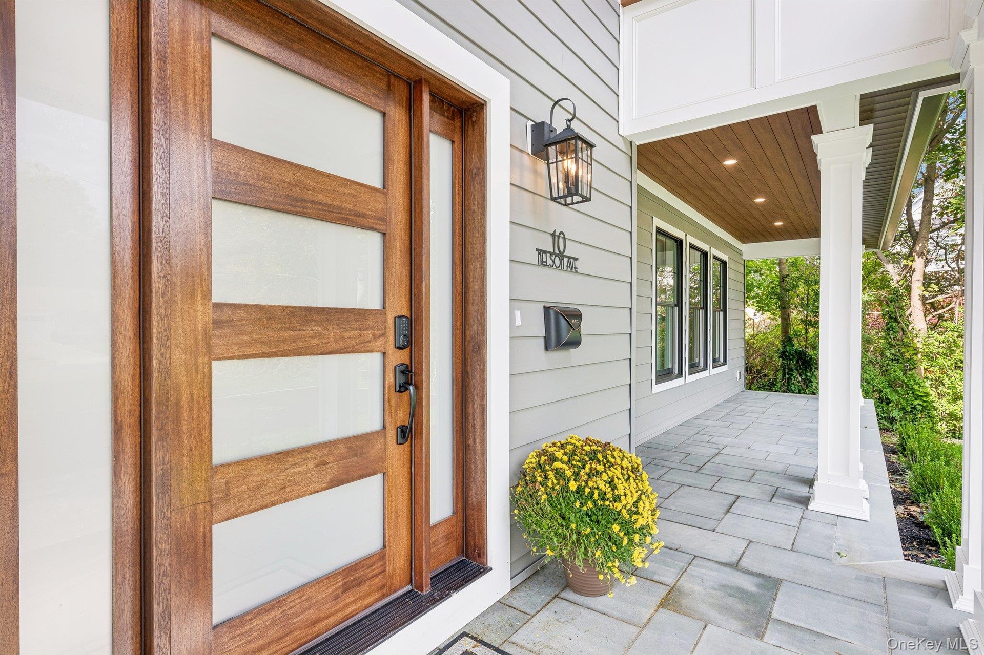 A glass and wood front door opens to a light-filled entry. About 700 feet from this door, a latte waits for you at CoHo Coffee House inside the Baypor