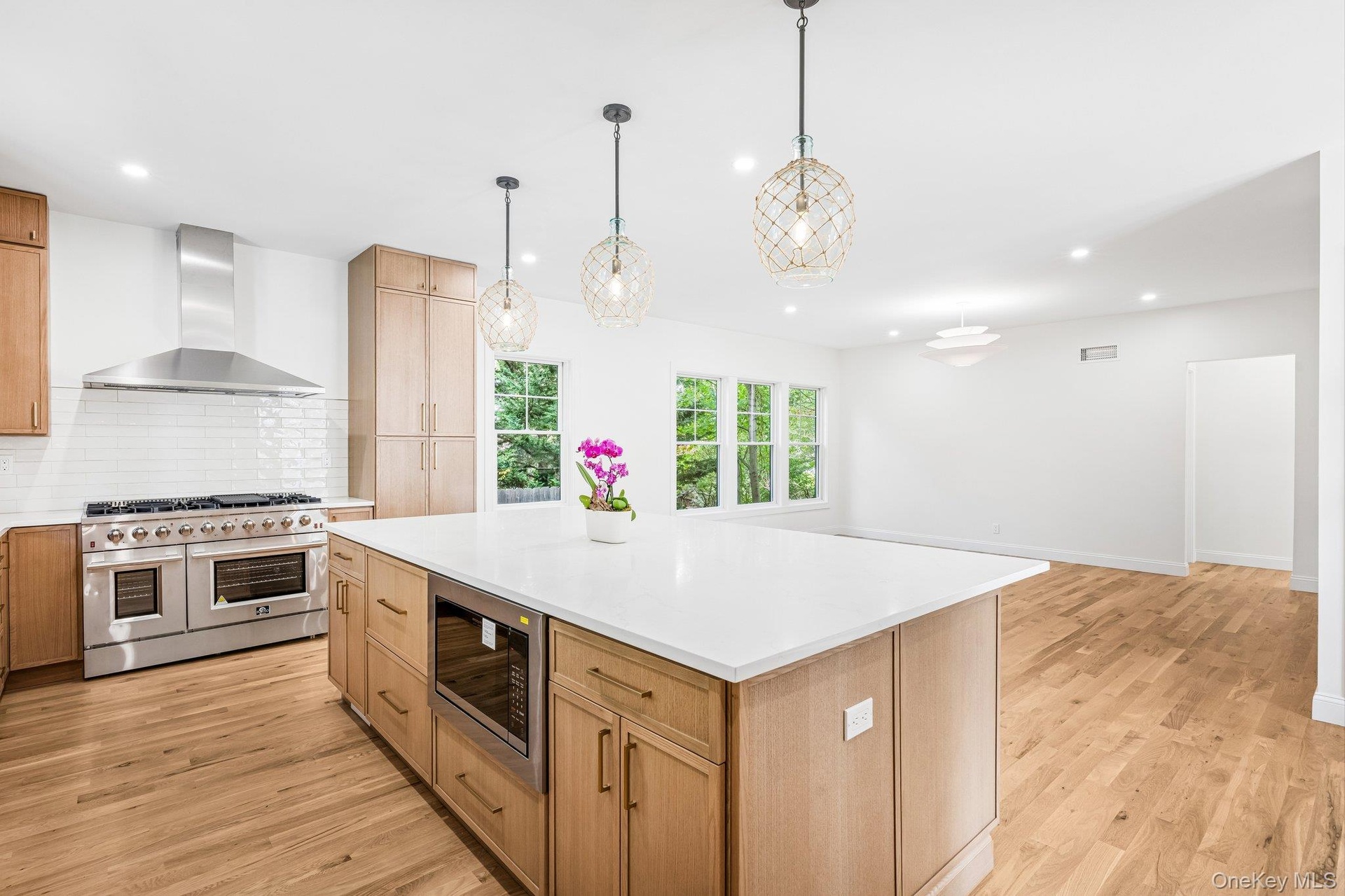 A 48-inch, 8-burner gas range anchors the kitchen. Dining out instead? Stella Trattoria on Montauk Highway is about five minutes from home, and Cavana