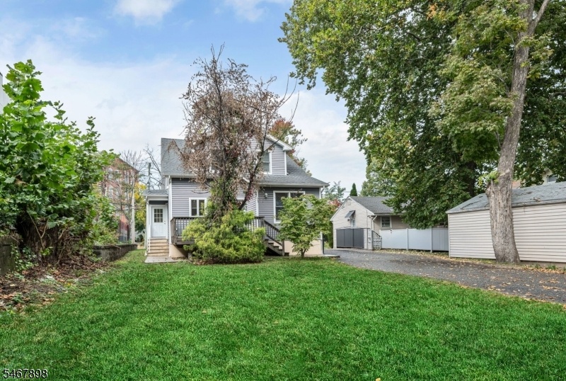 Rear View of Home & Yard