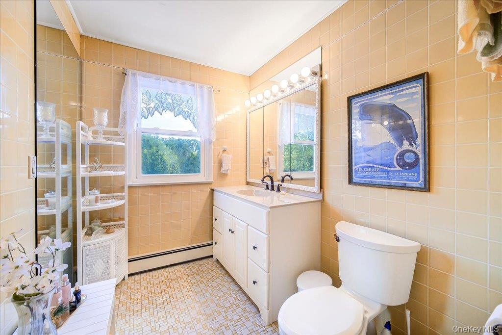 Large and sunny second floor full bath with tub-shower.