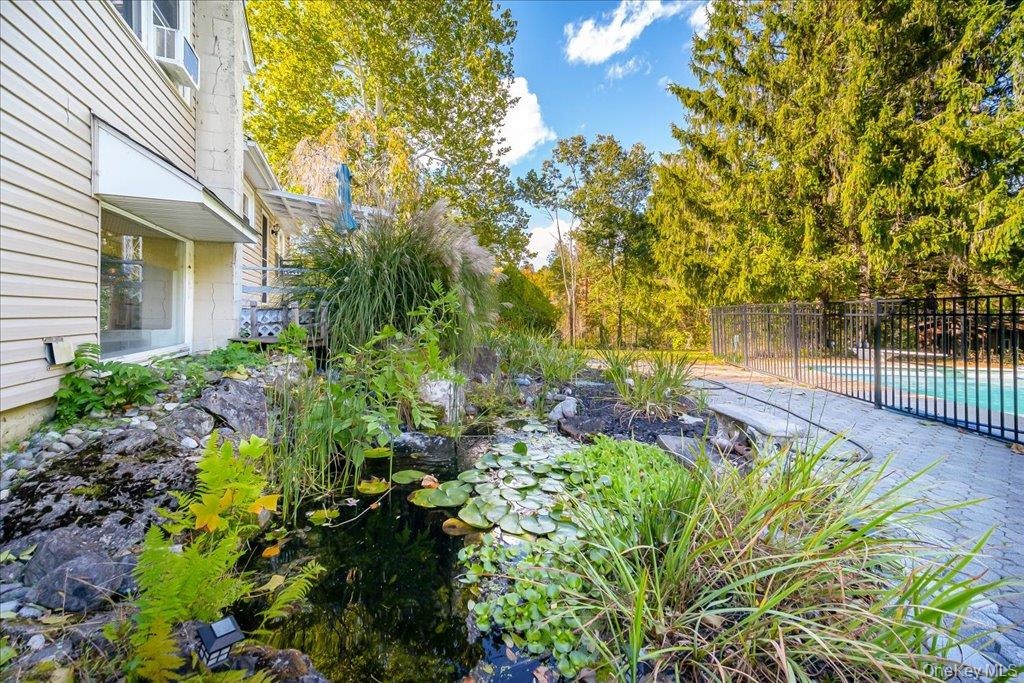 The pool-side koi pond and gardens offer a zen-like setting!