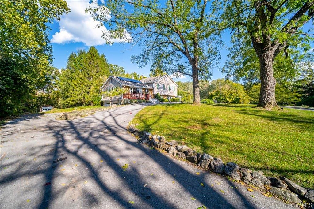 Lovely circular drive offers a grand entrance and plenty of parking!