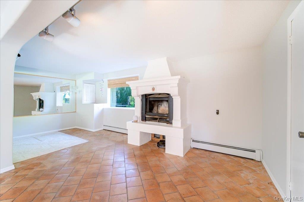 Lovely working wood-burning fireplace for chilly nights!