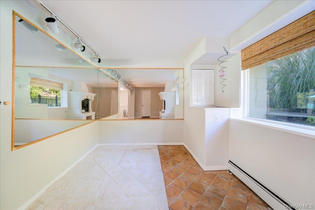 This space formerly housed a hot-tub and overlooks the pool!