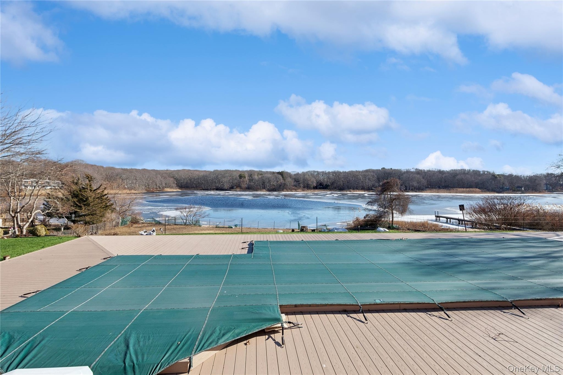 View of pool featuring a water view